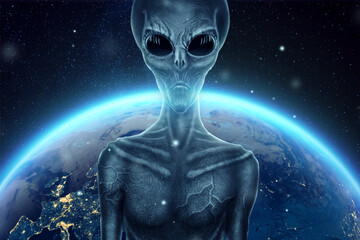 A gray alien, humonoid, with black large glass eyes against the background of the globe. UFO...