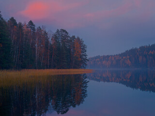 Fototapeta premium Golden Autumn on the background of a large lake