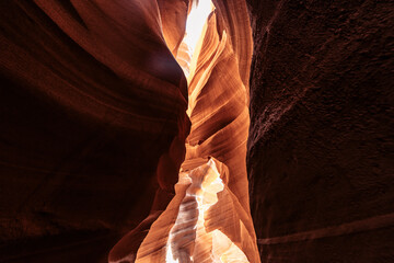 Sinuous sandstone layers in Antelope Canyon, narrow walls in a cave