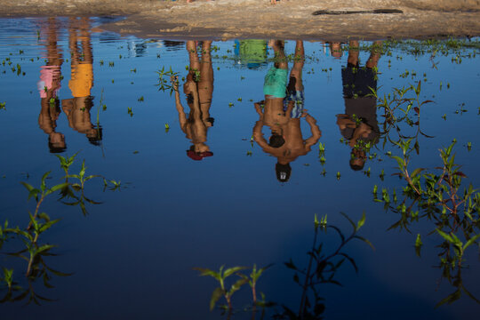People enjoy the beach of the Gualeguay river, in Entre Rios, Argentina