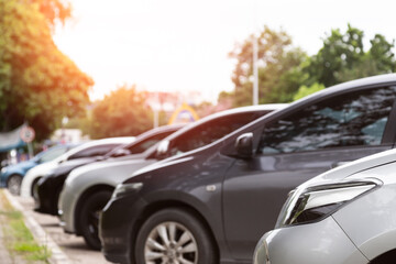 Front of car parking in line with sunlight.