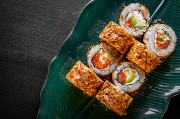 sushi roll with fish and rice in plate