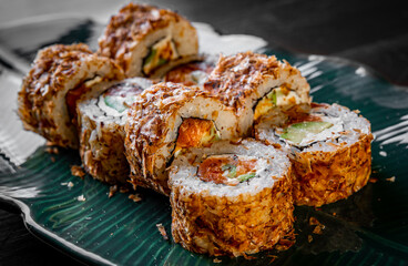 sushi roll with fish and rice in plate
