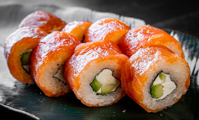 sushi roll with fish and rice in plate