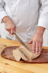 chef cutting bread