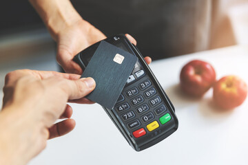 nfc contactless payment by credit card and pos terminal