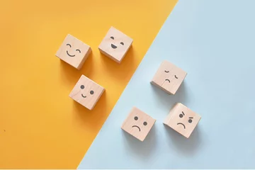 Poster Image of different emotions on wooden cubes. © fidaolga