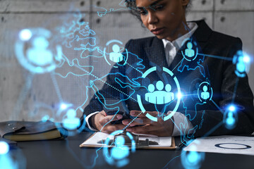 Businesswoman using phone, work in modern office on new project. Double exposure. Concept of...