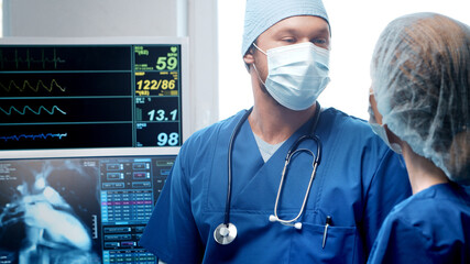 Professional medical doctors working in emergency medicine. Portrait of the surgeon and the nurse...