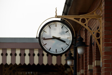 Old fashion retro clock in steam train station