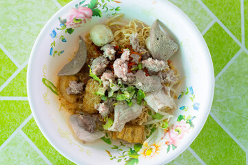 Asian spicy noodle with chopped pork