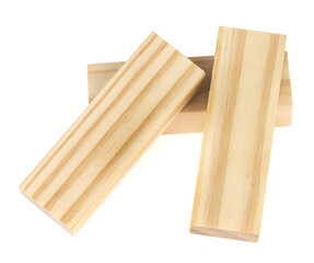 Stack wooden blocks  isolated on a white background. Wooden Blocks disrupted and building on white background
