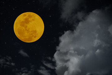 Obraz na płótnie Canvas Full moon with blurred cloud on the sky.