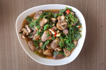 Vegan food - stir fried mushroom with sweet basil