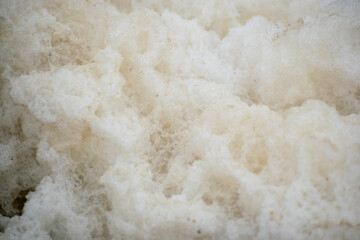 Fototapeta na wymiar Sea coastal foam close up.