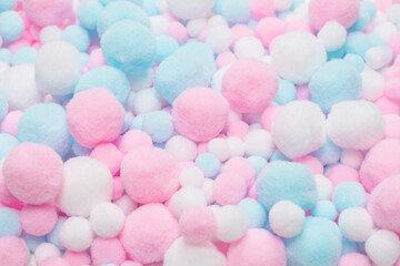 White, pink and blue soft pompons.