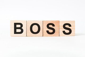 word BOSS on wooden blocks, white background, business concept. business and Finance