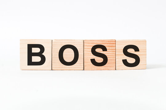 word BOSS on wooden blocks, white background, business concept. business and Finance