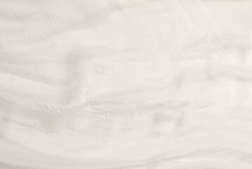 Soft smooth white silk fabric background. Fabric texture.