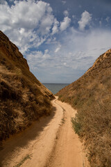 Big cave canyon in the Kherson region on the seashore.