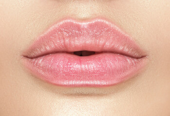 Beautiful young woman's lips closeup, Part of the model girl face, youth concept. Perfect healthy...