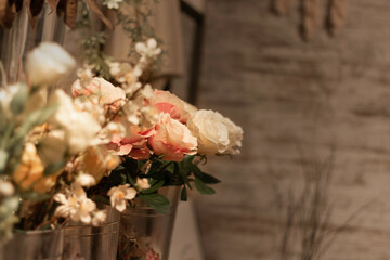 Close up photography flowers displayed in metal pots to give on Valentine's Day. White and pink roses to put in vases and decorate interiors