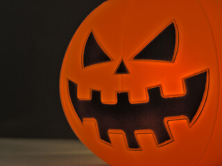 Close up view of scary Halloween pumpkin lantern for halloween party night with black background. Selective focus