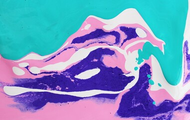 Abstract white-pink-blue background. Acrylic paint flows freely and creates an interesting pattern....