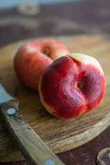 peaches on a wooden board