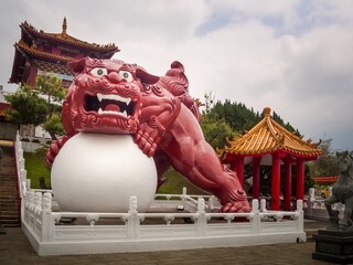 A Chinese Guardian Lion with the ball at the main entrance of We