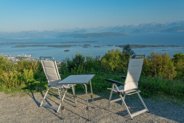 Fjord sea mountain view, table and chairs, Molde, Norway