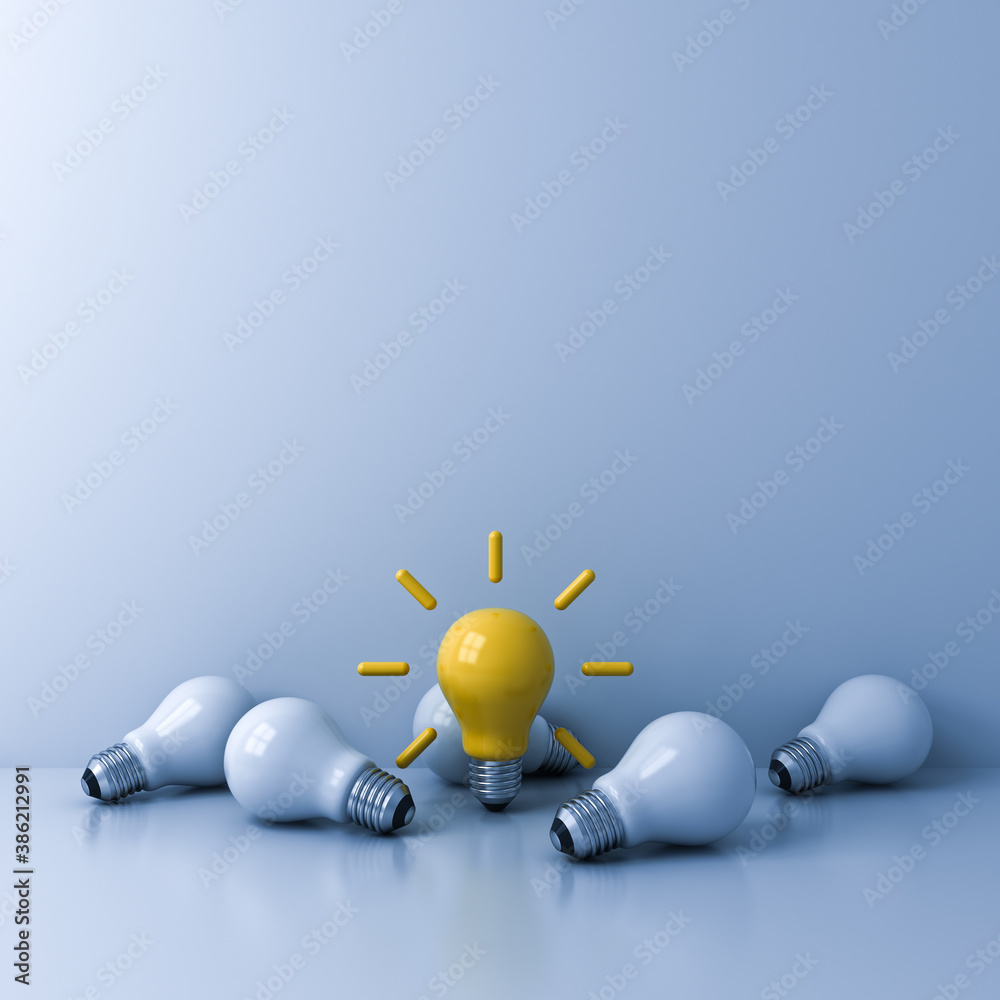 Leinwandbilder standing out from the crowd concept bright yellow idea bulb with the dim unlit white bulbs on light 