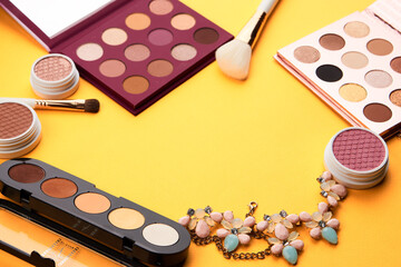 Professional cosmetics palette with eyeshadow makeup brushes cropped look