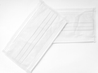 White surgical face mask on white background,  Health care concept and can protect virus covid-19, medical masks, fabric mask protect air pollution