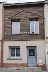 Fototapeta na wymiar AMIENS, FRANCE - MAY 26, 2019: Beautiful old Colorful houses in Amiens old town. Amiens - city and commune in northern France, 120 km north of Paris, capital of Somme department, Hauts-de-France.