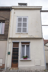AMIENS, FRANCE - MAY 26, 2019: Beautiful old Colorful houses in Amiens old town. Amiens - city and commune in northern France, 120 km north of Paris, capital of Somme department, Hauts-de-France.