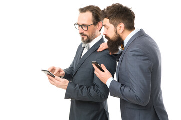 Satisfied with their work. partnership of men speaking on phone. mature men. Agile business....