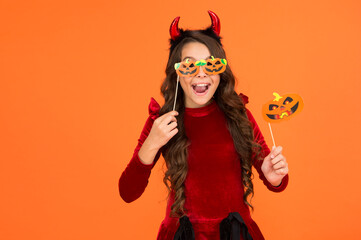 carnival festive costume of witch. kid with party accessory. child celebrate autumn holiday. teenage girl in devil horns celebrate halloween. happy halloween. trick or treat. Stay nearby for a spell