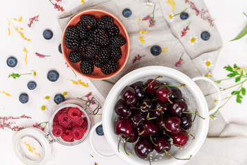 Cherries, raspberries and blackberries from above