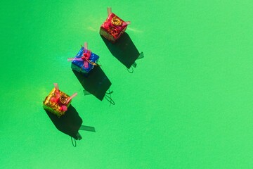 three christmas gifts on green background concept kings and gold incense and myrrh