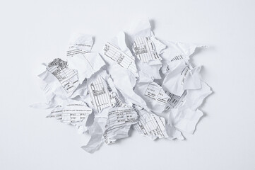 Torn paper bill of a payment. White background.