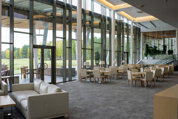 Interior of large luxurious restaurant inside contemporary business center