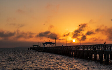 Fototapeta na wymiar Ballast Point Park, S. Tampa Sunrise over the Pier