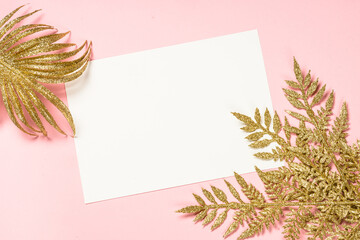 Christmas pink flat lay background with present box and decorations.