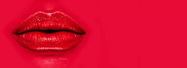 Poster Beautiful young woman's lips closeup, on red background. Plastic surgery, fillers, injection. Part of the model girl face, youth concept. Perfect mouth, make-up. Health care. Art design.  © Subbotina Anna