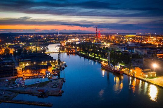 Amazing scenery of the shipyard and canals of Gdansk at dusk. Poland