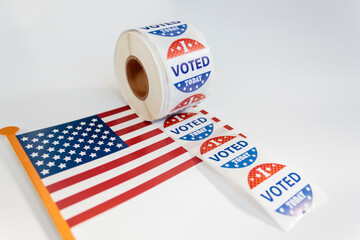 I Voted Today stickers and american flag on white background