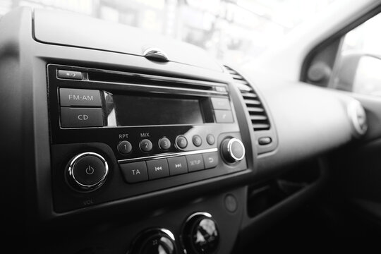 Multimedia system in car. Black and white photo of car interior.