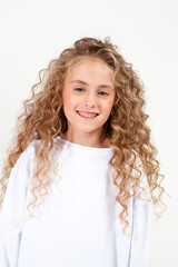 curly girl in white long sleeve t-shirt