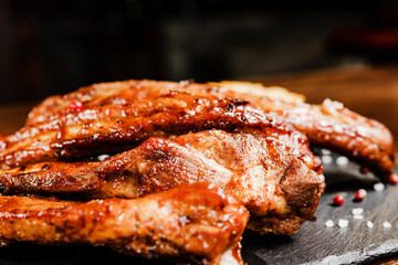 barbecue grill ribs on a black mica Board
